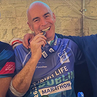 Gordon Walsh with his marathon finishers' medal