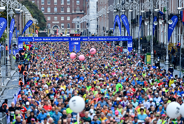 a large crowd of runners assembled at the start line of the 2023 Dublin marathon