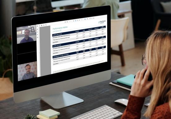 person watching First Sentier webinar on a monitor