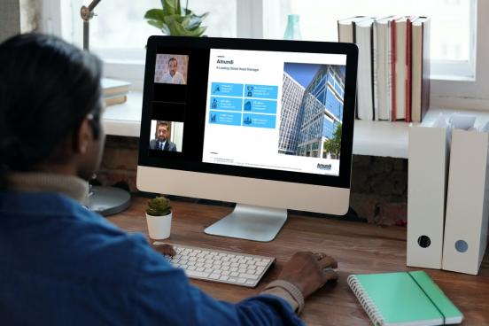Man watching Portus webinar on a monitor