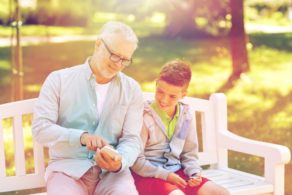 grandfather on phone with grandson
