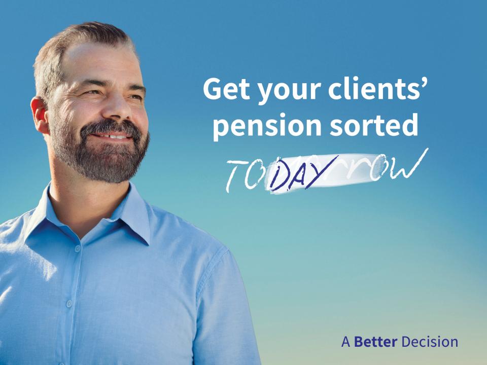 A smiling man in a blue shirt